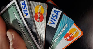 Evasione fiscale: multe in arrivo per chi non accetta bancomat e carte di credito